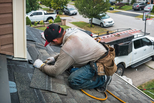 Professional Roof Replacement technician working in Beachwood, NJ